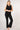 Close up track side panel detail figure firming bootcut leggings black - TLC Sport