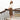 Eve wide fit almond suede court shoes worn on model, side profile