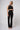 Black high waist bootcut compression leggings figure firming full length side view - TLC Sport