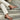 Fliss wide fit brown leather courts worn on model showing cross-strap detail