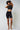 Black compression biker shorts high waist worn with crop bra full length front - TLC Sport