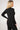 Longline compression zip jacket black bum covering back view - TLC Sport
