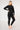 Compression longline zip jacket black structured panels slimming side view - TLC Sport