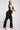 Extra strong compression curve bootcut leggings black bum lifting back view - TLC Sport