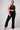 Plus size model curve bootcut compression leggings black high waist pocket full length front - TLC Sport
