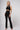 Lightweight strong compression high waist bootcut leggings black worn with matching crop bra full length - TLC Sport