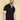Tall slim man wearing an XL tall black zip polo shirt.