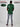 A shot from behind of a tall and slim guy in a studio and wearing a dark green large tall slim t-shirt.