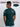 A shot from behind of a tall and slim guy in a studio and wearing a dark teal medium tall slim t-shirt.