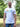 An upper body shot of a tall slim guy in a park wearing an XL tall and slim fitting graphic t-shirt in white.