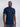 A tall slim man wearing an large tall heavyweight midnight blue t-shirt.
