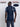 A shot from behind of a tall slim man wearing a large tall heavyweight midnight blue t-shirt.