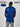 A shot from behind of a tall and slim guy in a studio and wearing a navy large tall slim t-shirt.