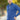 A tall and slim man standing on a path in  a park. The smiling model is wearing a cobalt quarter zip sweatshirt. The tall cobalt quarter zip sweatshirt features 2.5" longer sleeves, 100% organic french terry cotton, and is soft & comfy. It's  ideal for tall slim men 6'2"+.