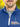 A close-up of the tall cobalt quarter zip collar and the durable metal zipper.