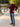 A head to toe shot of a tall athletic guy in a park wearing an XL tall extra long maroon quarter zip sweatshirt.