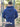 A shot from behind of a tall and broad guy standing in a tennis court and wearing a 2XL Tall dark navy zip-up hoodie.