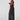 Black wide-leg pants with sheer black organza sides. From The Sixes.